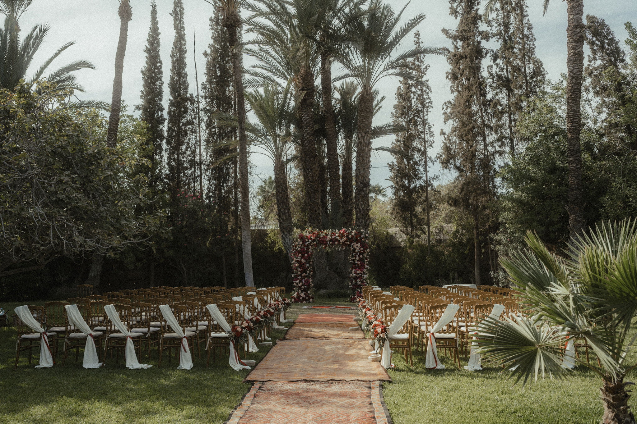 Outdoor wedding ceremony at luxury wedding in Marrakech styled by Marrakech wedding planners